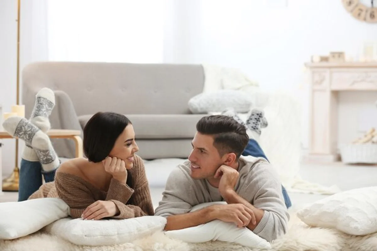 happy couple at home in winter