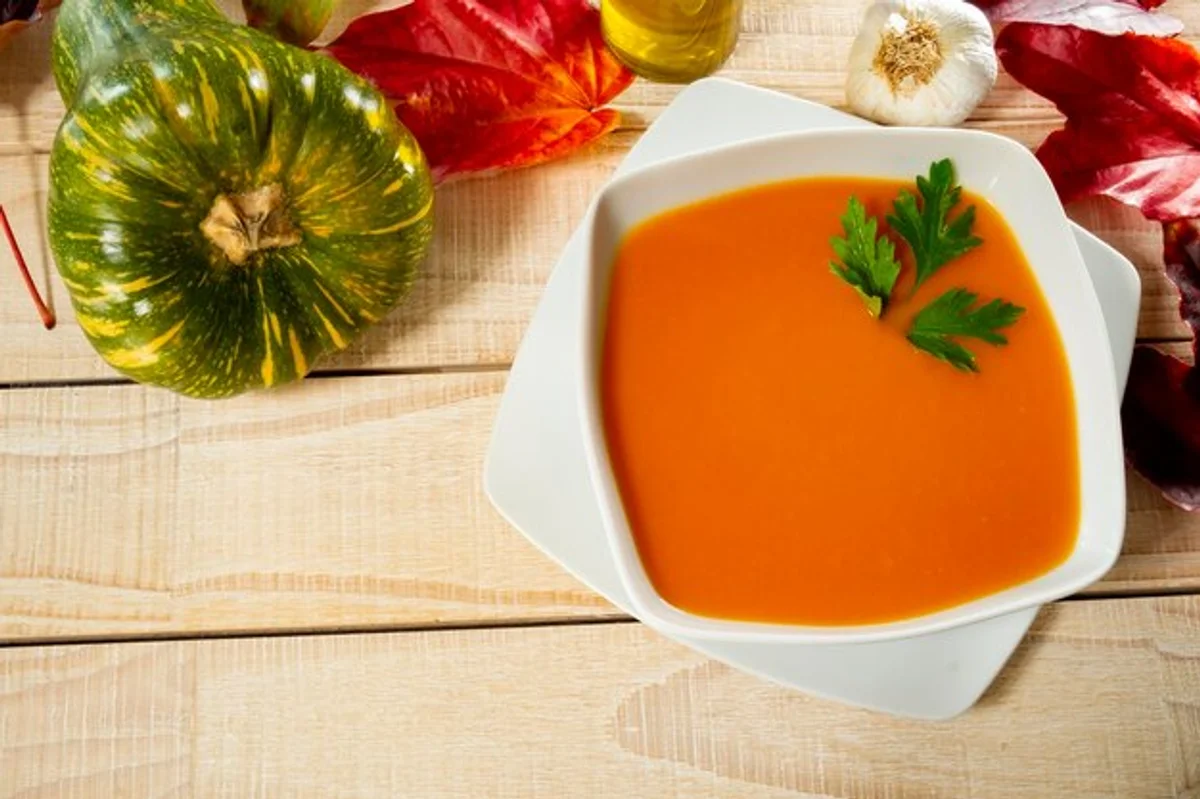 pumpkin soup serving detail autumn table