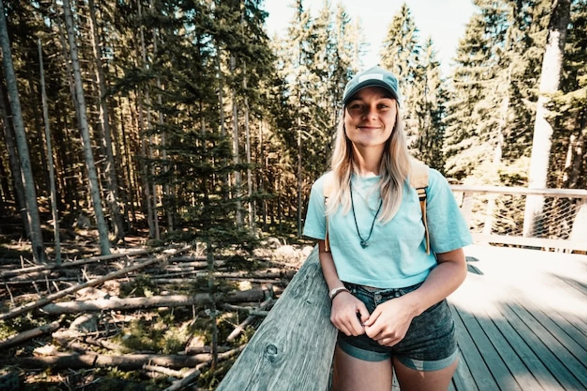 relaxed woman forest vacation Czech Republic