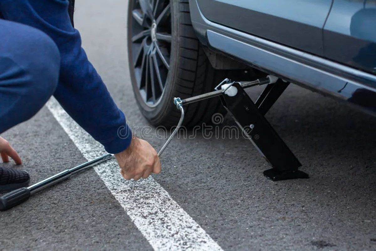 czech car tyre change spring road close up