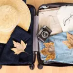 packing suitcase autumn travel minimalist