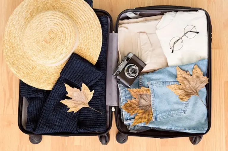 packing suitcase autumn travel minimalist