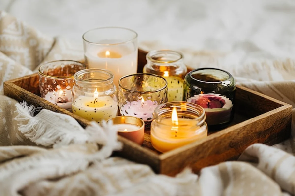 homemade autumn scented candles on table