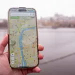 hiker using mobile map app for safety in czech republic
