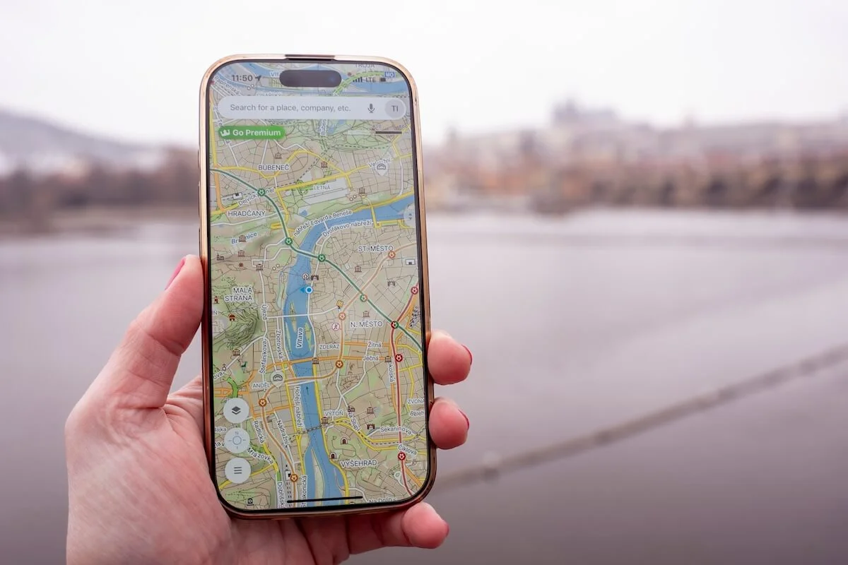 hiker using mobile map app for safety in czech republic