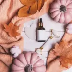 autumn natural skincare routine oil bottles flatlay
