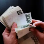 czech man woman investing mobile phone coins
