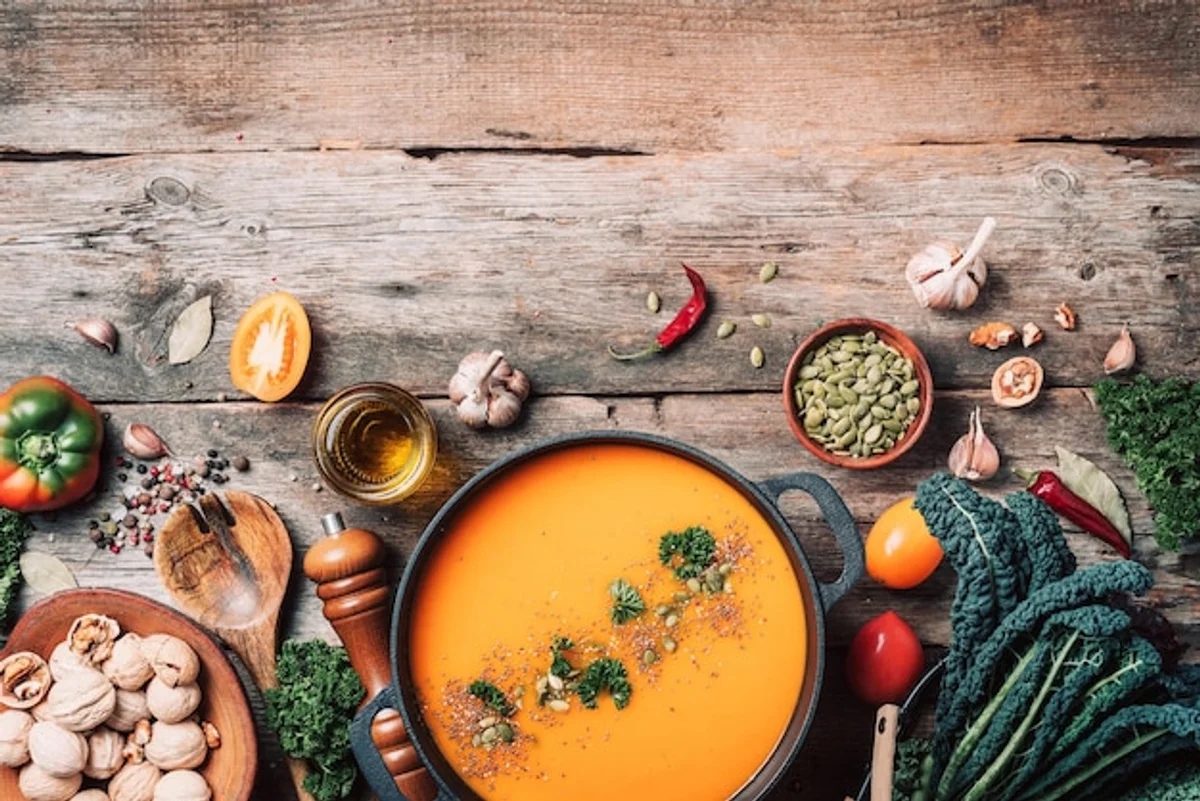 cooking process of pumpkin soup with fresh ingredients kitchen