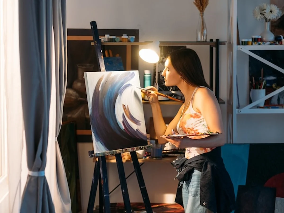 adult woman doing collage craft relaxing hobby