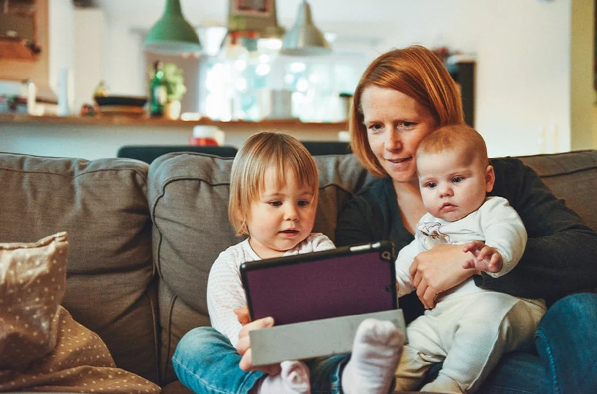 Czech family together at home saving energy heating tips