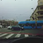 car parking during heavy rain Czech city street