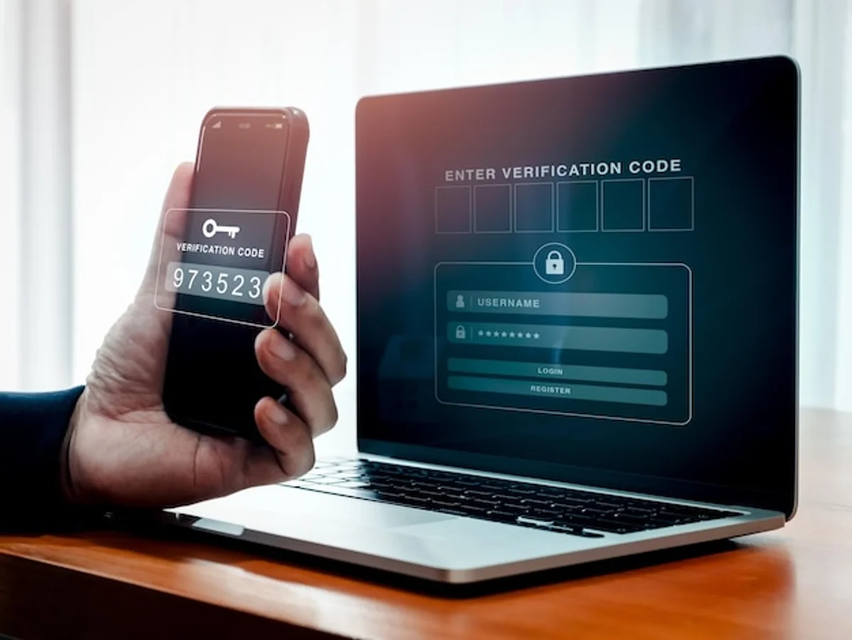 hands setting up two factor authentication app mobile