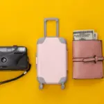 travel packing suitcase flat lay minimal style
