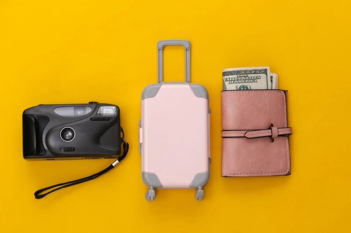 travel packing suitcase flat lay minimal style