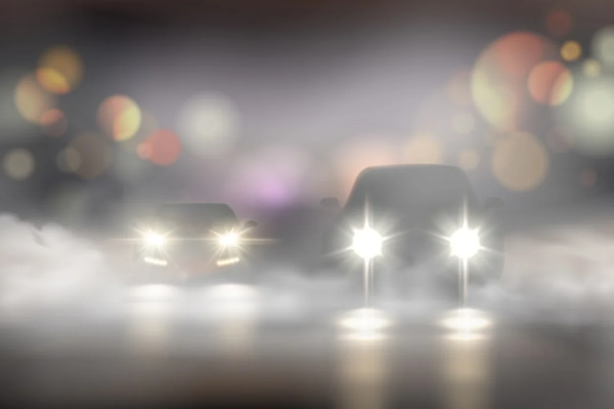car headlight silhouette foggy road czechia