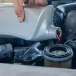 modern car engine oil change closeup