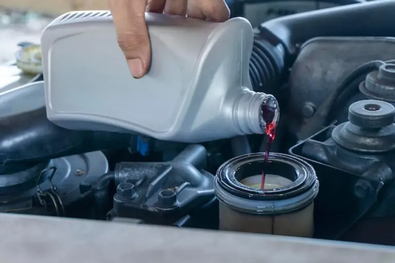 modern car engine oil change closeup