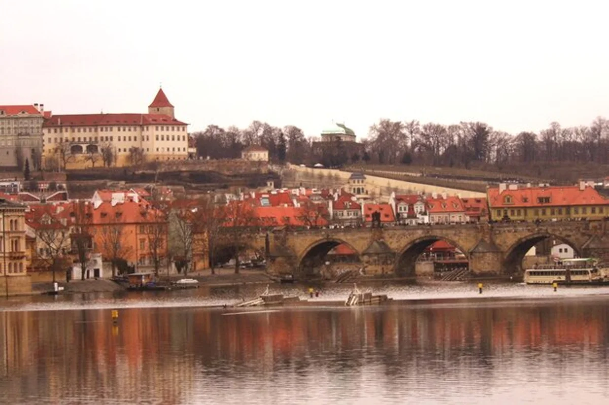 prague charles bridge november morning fog empty