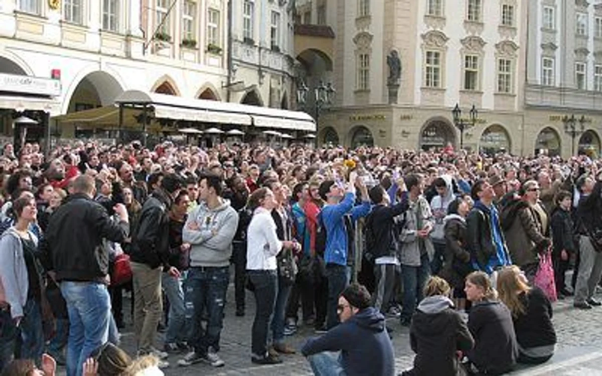 crowded prague tram during morning rush hour
