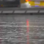 car safely parking in heavy rain europe