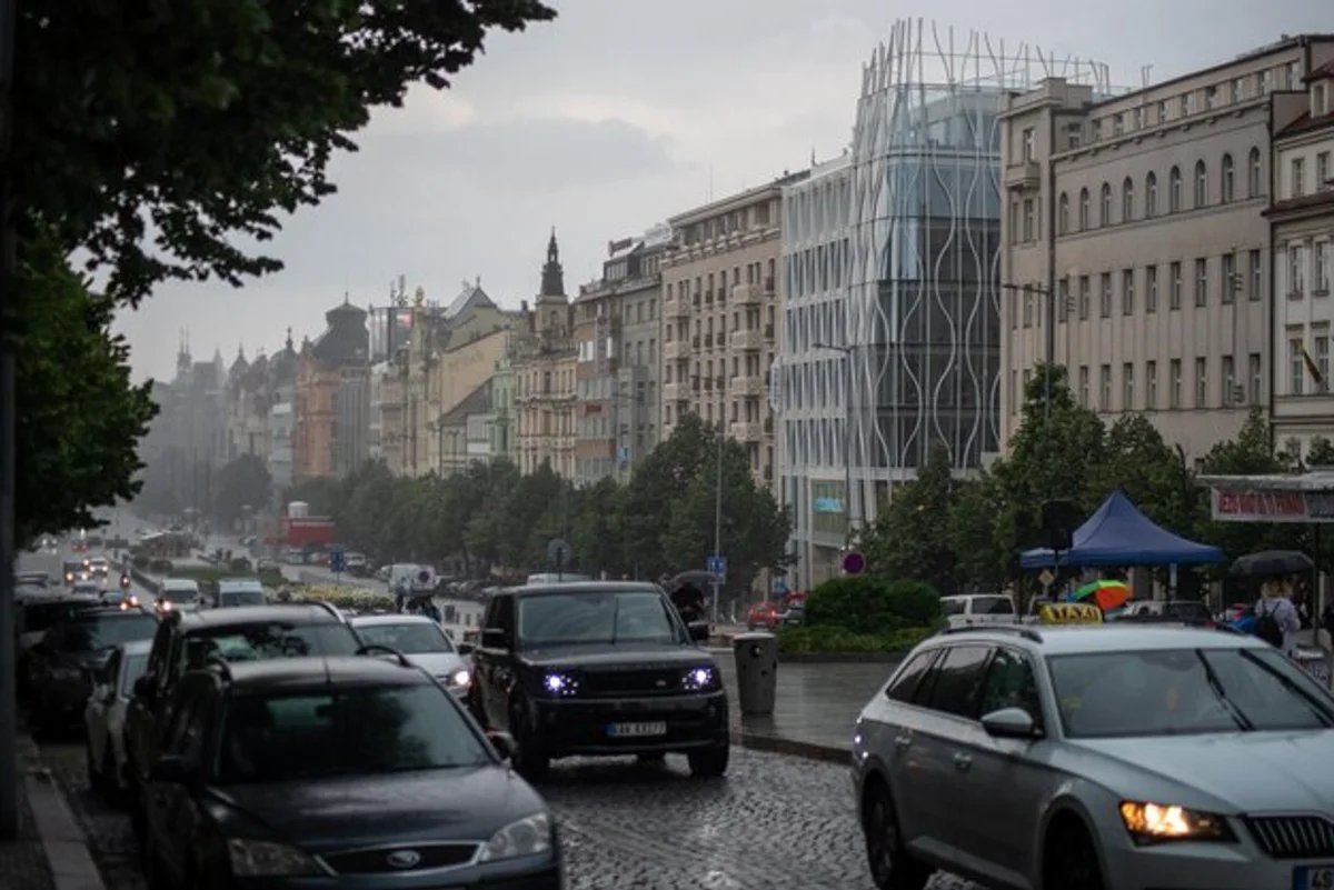 car parking in rain czech city street
