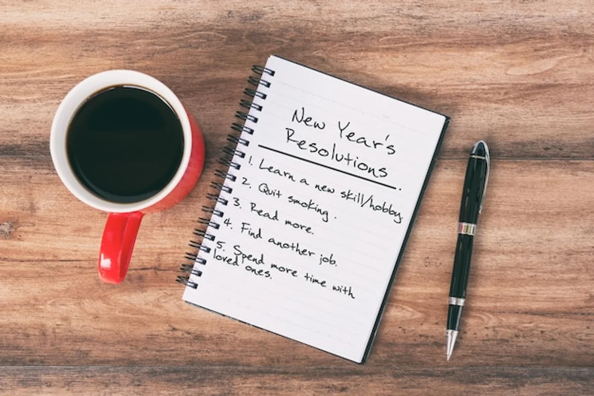 early planning for new year goals notebook coffee