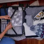packing suitcase efficiently top view neat