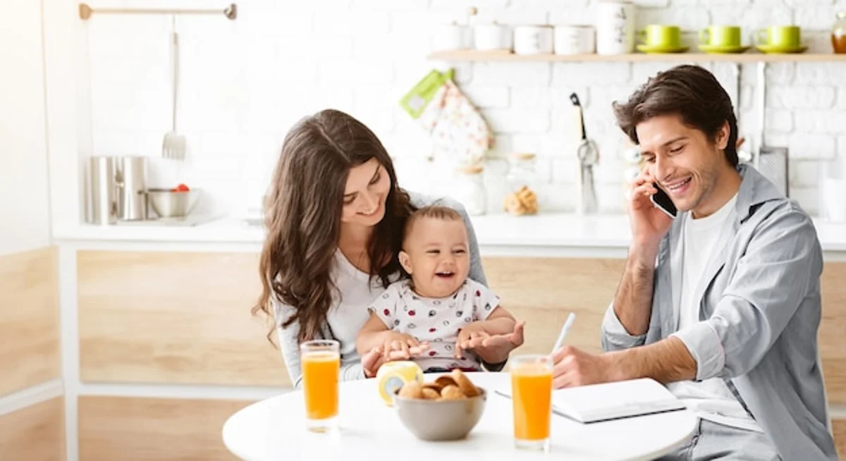 happy family talking in the kitchen candid