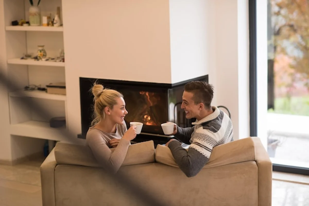 happy couple talking at home autumn