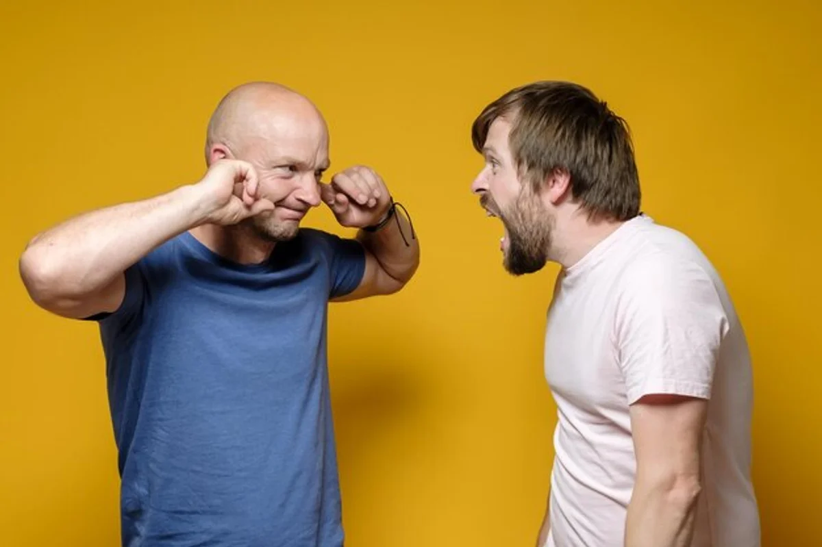 people arguing calmly at home