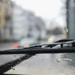 dirty windshield wipers rain close up