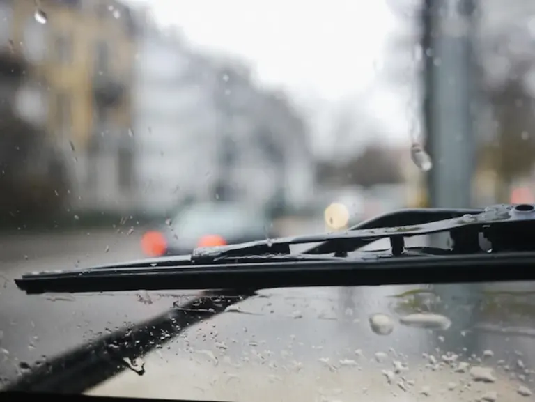 dirty windshield wipers rain close up