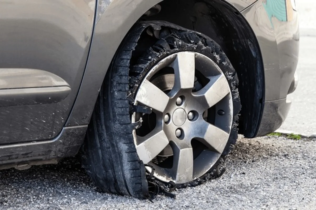 damaged car tire after rainy weather chechia