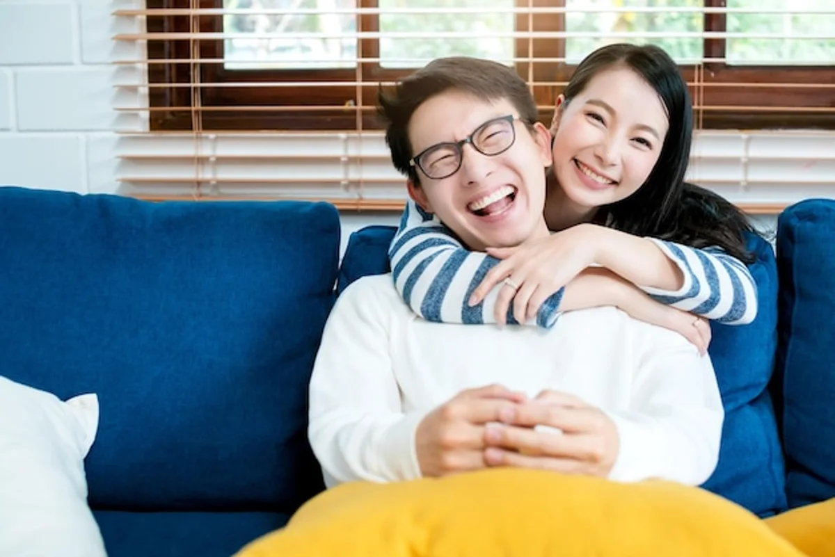 happy couple deep conversation living room