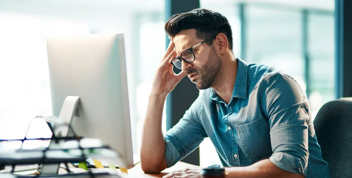 stressed office worker burnout Czech company