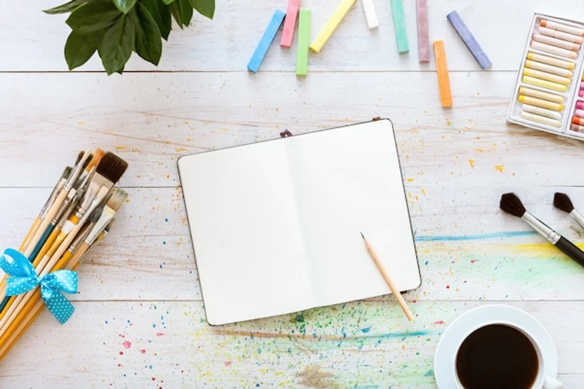 art journaling flat lay pastel creative desk