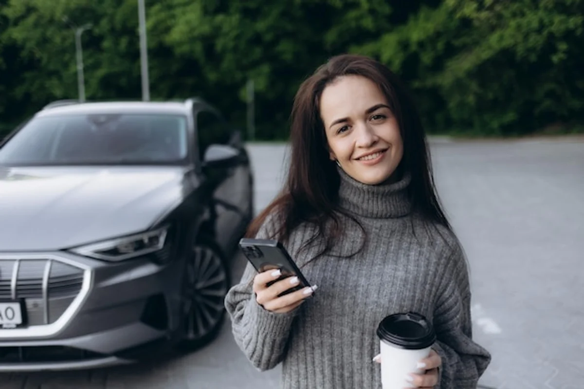 futuristic electric cars charging european city street daytime